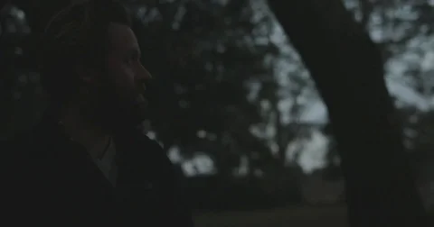Bearded man outside at sunrise Stock Footage 76404429