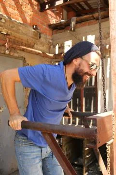 Bearded man on parallel bars Stock Photos