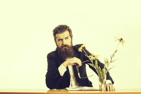 Bearded man professor glasses at table Stock Photos