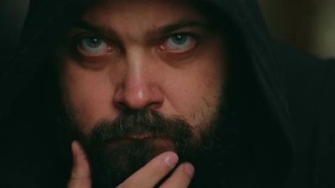 Bearded man sadly looking at the camera Stock Footage 195993490