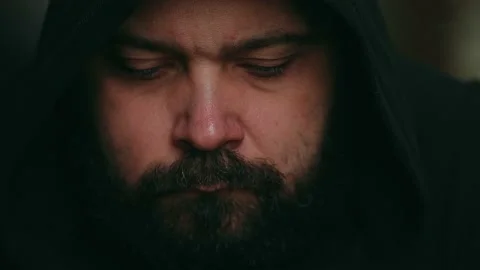 Bearded man sadly looking down Stock Footage 195993652