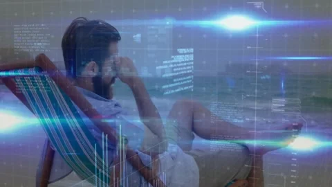 Bearded man scanning interface on beach shore, showing tech graphs, code charts Stock Footage 330662347