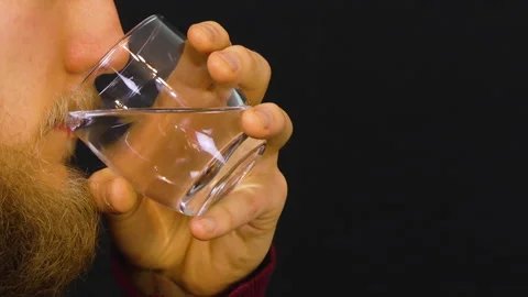 Bearded Man Sips Water Stock Footage 305547145
