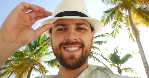 Bearded man smiling on the beach Stock Footage 58951199