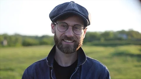 Bearded Man Smiling Looking at Camera Stock Footage 89938013