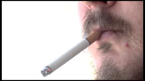 Bearded man smokes  Stock Footage 1182490