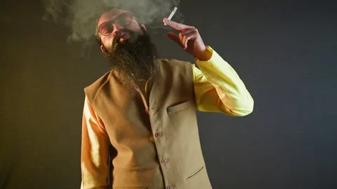 Bearded man stands puffing in bold silence Stock Footage 307276656
