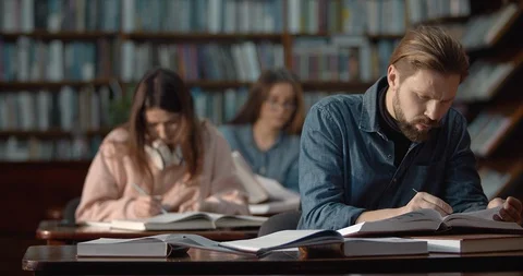 Bearded Man Studying in Library Stock Footage 124666859