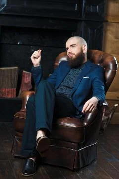 A bearded man in a suit. Stock Photos