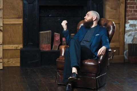 A bearded man in a suit. Stock Photos