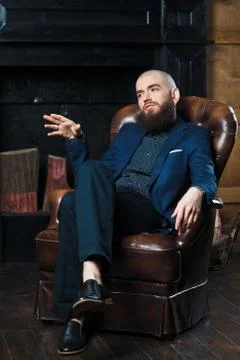 A bearded man in a suit. Stock Photos