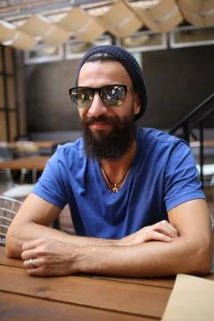 Bearded man with sunglasses Stock Photos