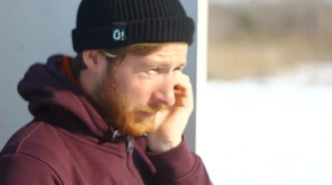 Bearded man talking on the phone Video stock 36418505