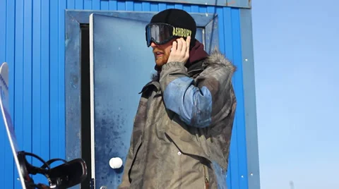 Bearded man talking on the phone Stock Footage 36419252