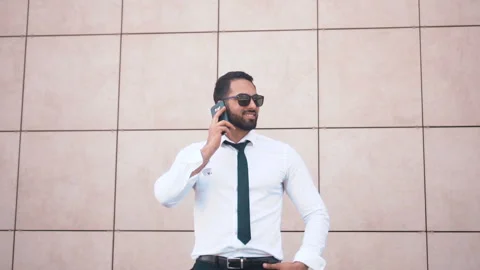 Bearded Man Talking by Phone 库存影片 91792094