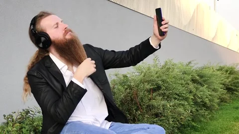 Bearded man talking on video call Stock Footage 255392005