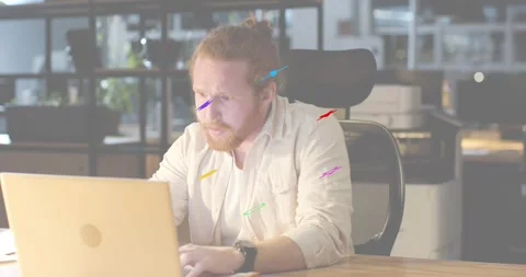 Bearded man in tech office with shapes popping causing frustration typing Stock Footage 318180155