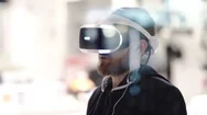 Bearded Man Uses Vr-Headset Display With Headphones For Virtual Reality Game Stock Footage