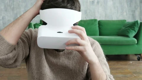 Bearded man uses VR-headset with for virtual reality game. Stock Footage 85735815