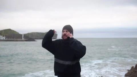 Bearded man using smartphone Stock Footage 146662679