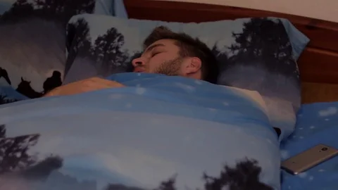 Bearded man wakeup fail 動画素材 83136863