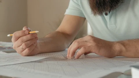 Bearded man at work. The designer draws a project. Design and idea. Video stock 120685628
