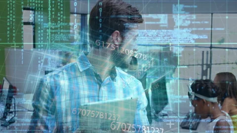 Bearded mentor in tech lab studying tablet activating data overlays while Stock Footage 313240589