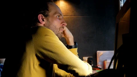 Bearded middle age on code of developing software at dark room Video stock 105336653