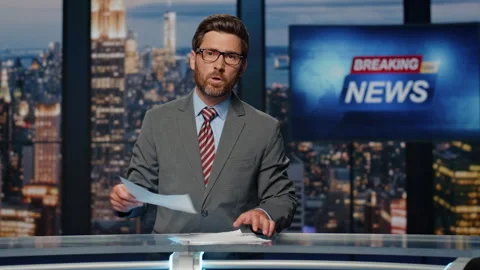 Bearded newscaster ending program in evening newsroom studio. Late breaking news Video stock 255331930