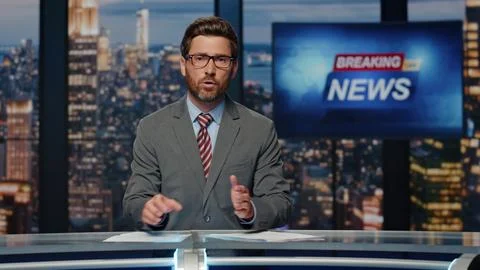 Bearded newscaster ending program in evening newsroom studio. Late breaking news Stock Photos
