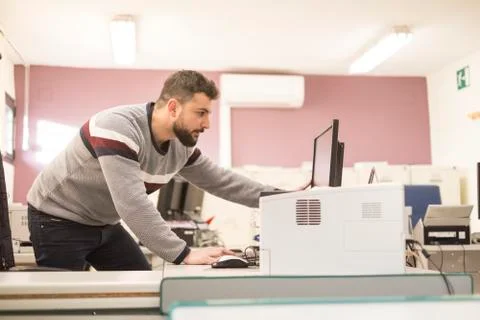 Bearded office worker looking computer Stock Photos
