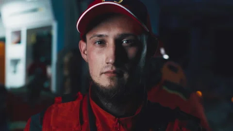 Bearded paramedic working at night Stock Footage 166143753