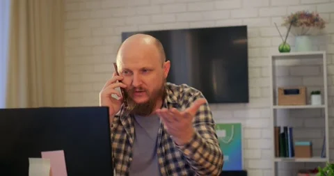 Bearded professional experiencing work stress, expressing intense emotions while Stock Footage 301525361