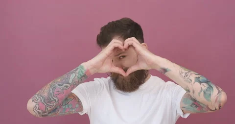 Bearded professional man on pink background. Emotions of real people. Stock Footage 155836624