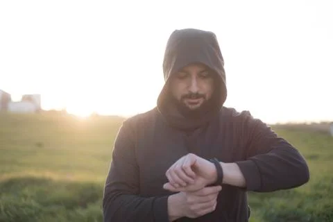 Bearded runner resting after training outdoors Stock-Fotos