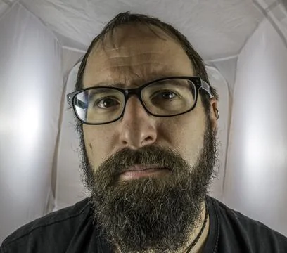 A bearded sad looking man in a depressive mood Stock Photos