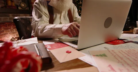 Bearded Santa Claus using laptop computer, typing on keyboard, buying New Year Stock Footage 162410425