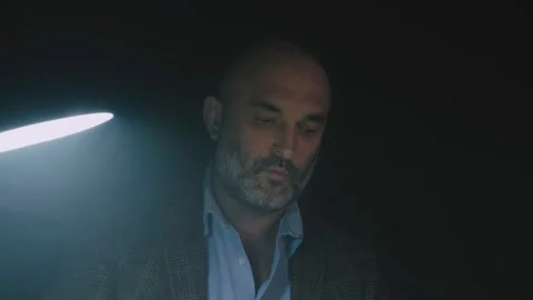 Bearded stylish writer typing on typewriter. Writer working on new book in Stock Footage 138050474