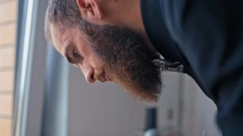 Bearded Tailor is Making a Pattern on the Fabric before Sew Fashionable Clothes Stock Footage 90471976