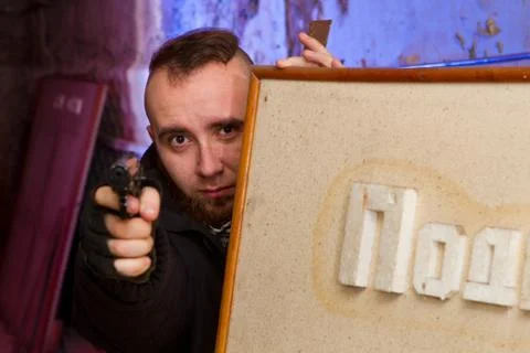 Bearded terrorist with a gun Stock Photos