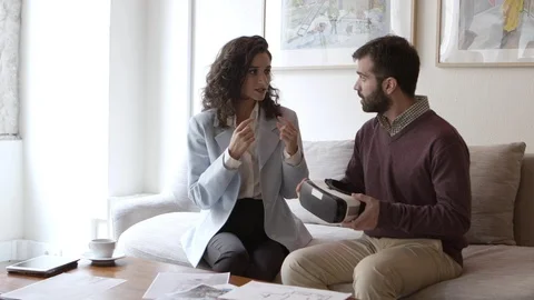 Bearded young man looking at interior design via VR technology Stock Footage 121002488