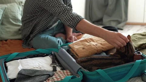 Beardly man and cat getting ready for travel Stock Footage 167342477