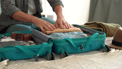 Beardly man getting ready for travel, Stock Footage 190567825