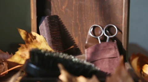 Beardmen vintage kit closeup with brush,comb and scissors for Stock-Footage 55768751