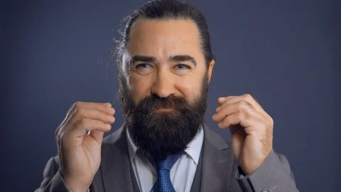 Beardy busnessman in office Stock Footage 109175996
