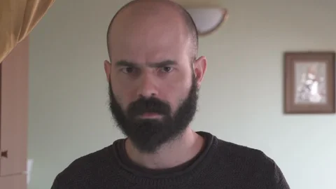 Beardy Man Reflecting with Funny Faces Video stock 88870828