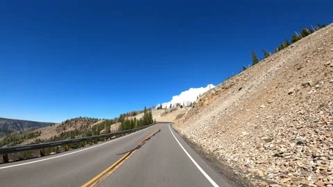 Beartooth Pass Rocky Mountains Red Lodge Montana Highway 212  Driving POV Stock Footage 219889011