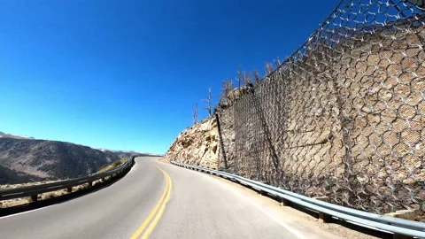 Beartooth Pass Rocky Mountains Red Lodge Montana Highway 212  Driving POV Stock Footage 219889013