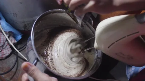 Beat the cookie dough using a mixer Stock Footage 272286469