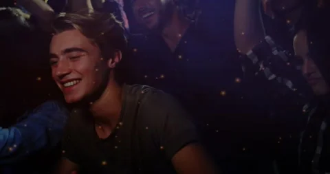 Beat dropping, man moving forward, clapping, laughing, engaging concert crowd, Video stock 321890237